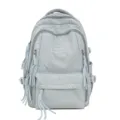 Close-up detail of the light grey Chinese style embroidered student backpack with tassel zips. - Without Pendant / Blue