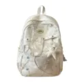 Dettaglio zaino stile giapponese carino con stampa di stelle, ciondolo in pizzo e tasca frontale. - Bianco
