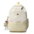 Large capacity student canvas backpack with cute bear pendant and stylish embroidery design. - Yellow