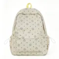 Cute star dot patterned nylon backpack detail, featuring front zip pocket and sturdy yellow handle. - L / Yellow
