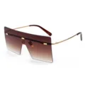 Gafas de sol oversize con parte superior plana, lentes marrones degradadas y finas varillas doradas. - Marco Dorado Lente Degradado Té C5