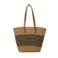 Detail view of the stylish woven straw tote bag with black stripes and brown handles. - Black White Stitching (Style 5)