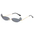 Trendy narrow rimless sunglasses featuring star accents, grey lenses, and sleek gold metal temples. - Star Shaped Style (3457) / Gold Frame Black Gray Lens