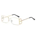 Gafas de metal dorado con lentes transparentes y diseño de letras único en las patillas para damas - Montura Dorada Lentes Blancas C6