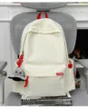 Korean style solid color large capacity casual student school bag backpack with octopus pendant - With Pendant / White