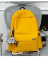 Korean style minimalist solid color large capacity school backpack for teen students daily use. - With Pendant / Yellow