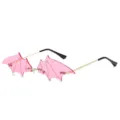Pink bat wing sunglasses rimless novelty eyewear for street style fashion and party wear. - Gold Frame Pink Lens C3