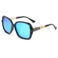 Élégantes lunettes de soleil polarisées pour femme avec verres bleus et branches strass. - Monture noire avec verres miroirs bleus C4