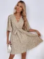 Khaki V-neck short sleeve wrap dress featuring white abstract dot print and waist belt. - S / Khaki