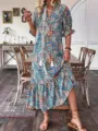 Boho paisley print midi dress featuring half sleeves, elegant tie neckline, and ruffle hem detail. - S / Blue