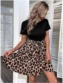 Robe femme haut noir manches courtes avec imprimé léopard et joli nœud papillon à la taille. - S / Robes / Imprimé léopard