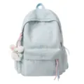 Mochila escolar azul pastel con lazos bordados y llavero de conejito de peluche tierno. - Sin Colgante / Azul
