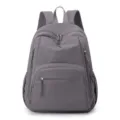 Sac à dos d'école décontracté en nylon gris avec plusieurs poches zippées pratiques. - Violet