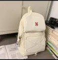 Minimalist beige canvas backpack with drawstring and cute pendant for daily outdoor travel. - S / With Pendant / White