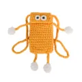 Detailed view of handmade knitted crochet phone bag with cute big eyes and playful limbs. - Yellow