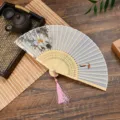Exquisite Chinese folding fan with delicate bamboo ribs and lotus painting for summer. - Style 1 (Lotus Play)