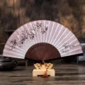 Chinese vintage folding linen fan with wooden carved frame and display stand, coffee flower. - No. 2 Brown Butterfly Flower