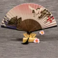 Eventail pliant en soie traditionnelle chinoise avec support en bois, design élégant. - Motif tortue et grue