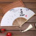 Ancient style linen folding fan with calligraphy and tassel, perfect for dance and photography. - 11 Distance