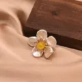 Baroque pearl flower brooch with yellow center and crystal accents, elegant jewelry accessory. - Yellow Jade