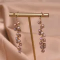 Orecchini lunghi con perle d'acqua dolce naturali, eleganti gioielli con perle viola. - Stile Nappa Lunga / Viola