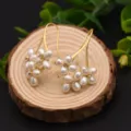 Freshwater pearl flower earrings, gold plated hook design, elegant jewelry variant. - Natural Freshwater Pearl