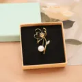 Elegant pearl flower brooch with cubic zirconia and black enamel, high quality pin jewelry. - Black Flower