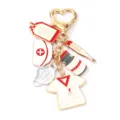Nurse medical theme metal keychain with cute charms, durable gold-tone alloy pendant for daily use. - White