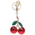 Elegant cherry keychain bag charm with glossy red cherries and green leaves. Perfect accessory. - Green Leaves and Red