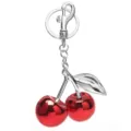Glänzender roter Kirschen Schlüsselanhänger Taschenschmuck, Metall Frucht Anhänger. - Silber + Rot