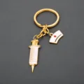 Medical nurse doctor theme metal keychain with cute syringe and cap pendants for gifts. - Medical Syringe Keychain (G-683)