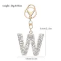 Glänzender Strass Buchstabe W Schlüsselanhänger Detailansicht mit goldenem Verschluss. - Buchstabe W / Weißer Strass