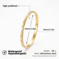 Pulsera rígida de acero inoxidable dorada con diseño de corazón y piedras brillantes. - Pulseras de corazón con diez estrás