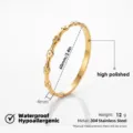 Pulsera brazalete de acero inoxidable dorado corazones, impermeable hipoalergénico pulido. - Brazaletes de corazón con estrás estilo bambú