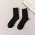 Cozy black fleece lined winter thick warm mid-calf wool socks for men and women - Black