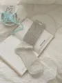 Calzini medi arricciati carini da donna in grigio chiaro, comodi e stilosi da indossare. - Taglia unica / Grigio