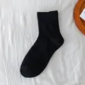 Solid black mid-calf cotton socks for women, comfortable daily casual wear basic hosiery style. - One Size / Mid-Calf Maternity Socks - Black