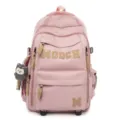 Pink grid student backpack detail with letter patch decoration and cute plush pendant design. - Pink
