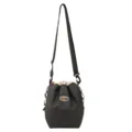 Detailed view of the black nylon drawstring bucket bag, highlighting texture and strap design. - Black