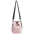 Detail view of the pink grid nylon drawstring bucket bag, showcasing the nice strap and texture. - Pink