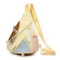 Detailed side view of a Japanese color-block multi-functional canvas crossbody ita backpack. - Yellow