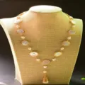 Barock Perlen Kette gold eingefasst Münzperle Quaste Pullover Kette modischer Schmuck - Knopf Kurz Quastenstil