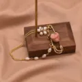 Gold safety pin brooch featuring pearl flower and pink rose bud with elegant pearl tassels. - Rose Pearl Brooch