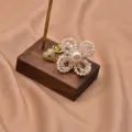 Pearl flower brooch with crystal beads and heart charm, elegant fashion jewelry piece. - Pearl Flower Heart Brooches