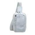 Light blue grid pattern chest bag detail, casual travel crossbody bag fabric closeup. - Blue