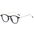 Gafas redondas antirrayas de luz azul estilo retro con montura negra y patillas doradas. - Patilla Dorada Anti-Luz Azul (C2) / Negro Mate