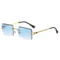 Schicke rahmenlose Sonnenbrille mit blauen Farbverlaufslinsen und goldenen Seil-Bügeln. - Goldrahmen Verlauf Blau