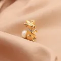 Elegant gold plated rabbit brooch with pearl tail cute animal pin for women apparel decoration - Rabbit