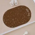 Close up view of brown oval absorbent floor mat with white speckle and cute letter print. - 40x60cm (Diatom Mud) / Korean Style Minimalist - 3