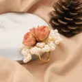 Natural pearl ring with dried flowers, vintage luxury style, elegant jewelry piece. - Three Pink Flowers White Pearl Style